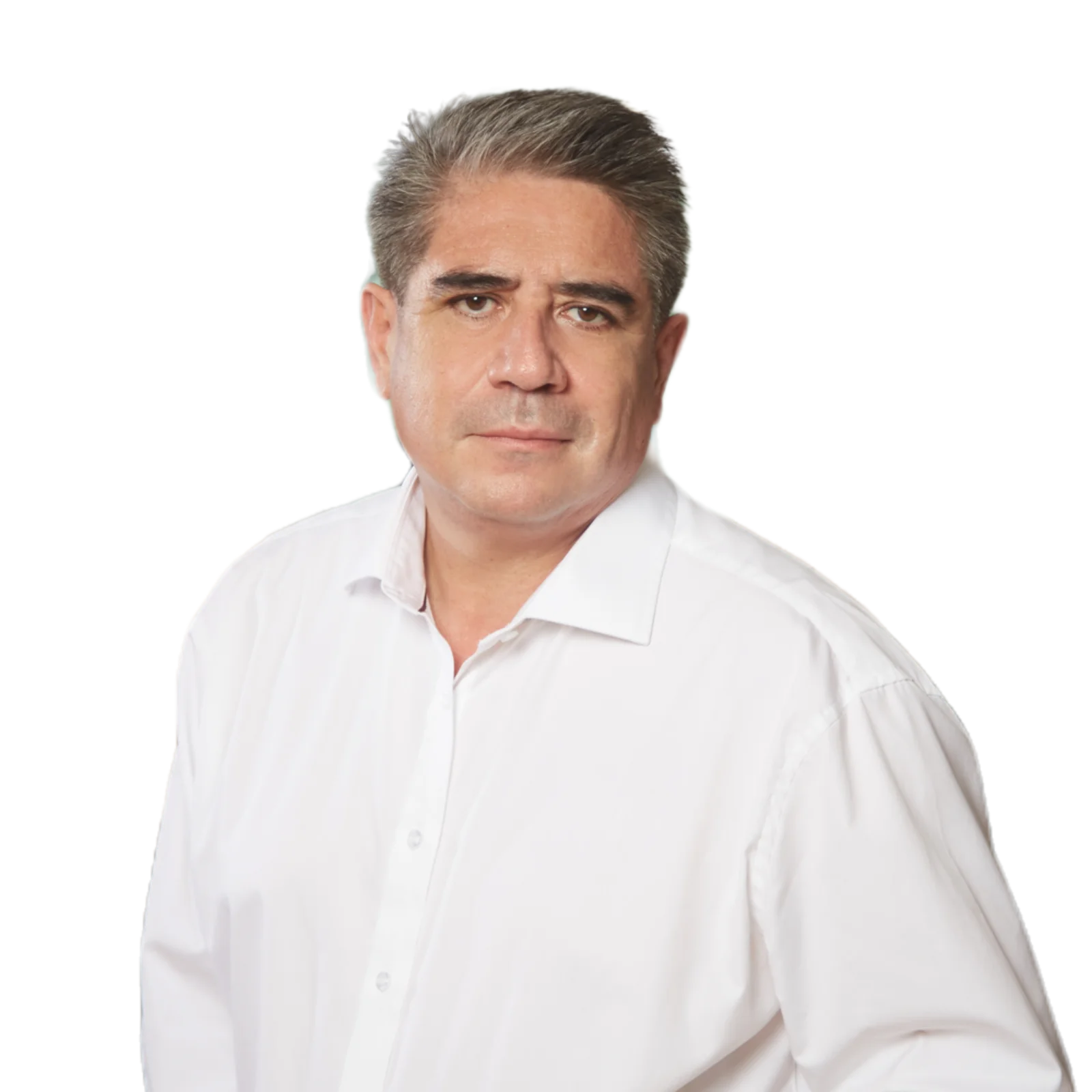 Professional headshot of Antonio Camacho Hubner wearing a white shirt with a serious expression.