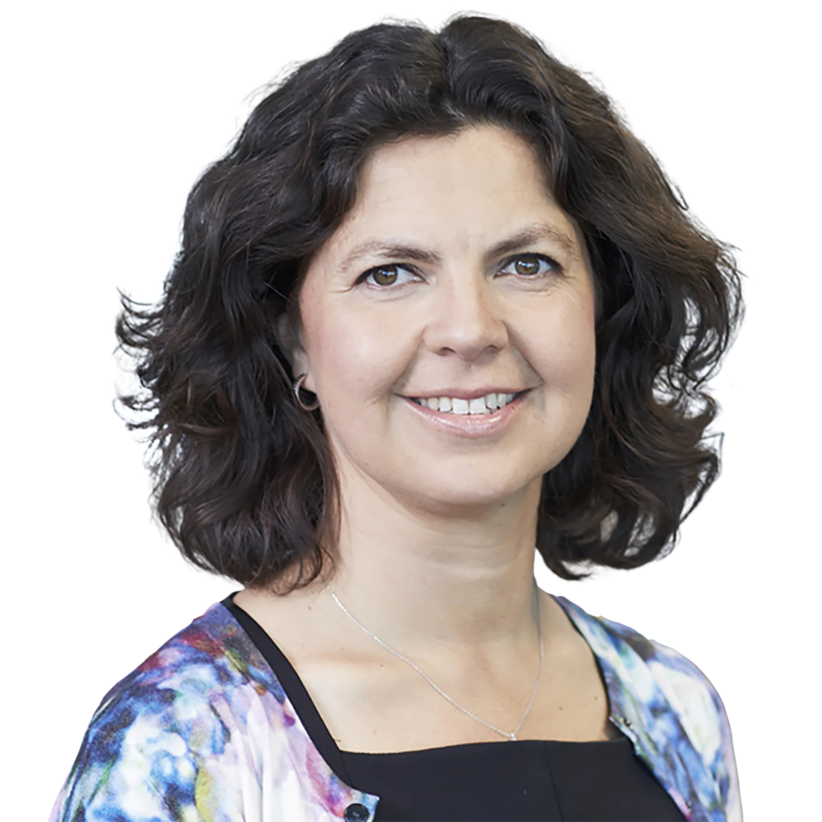 Portrait of Marta Melon with curly hair and a colorful top.