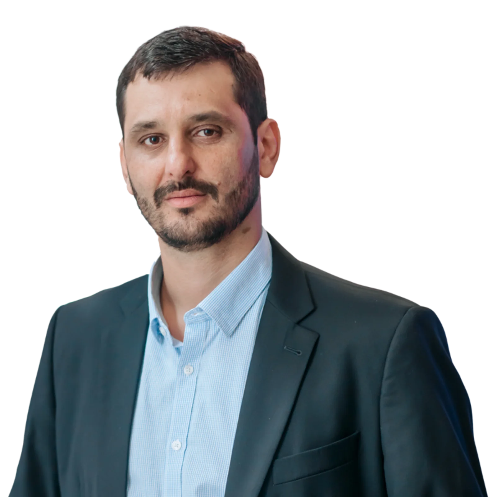 Professional portrait of Marco Silva wearing a blue shirt and a dark suit.