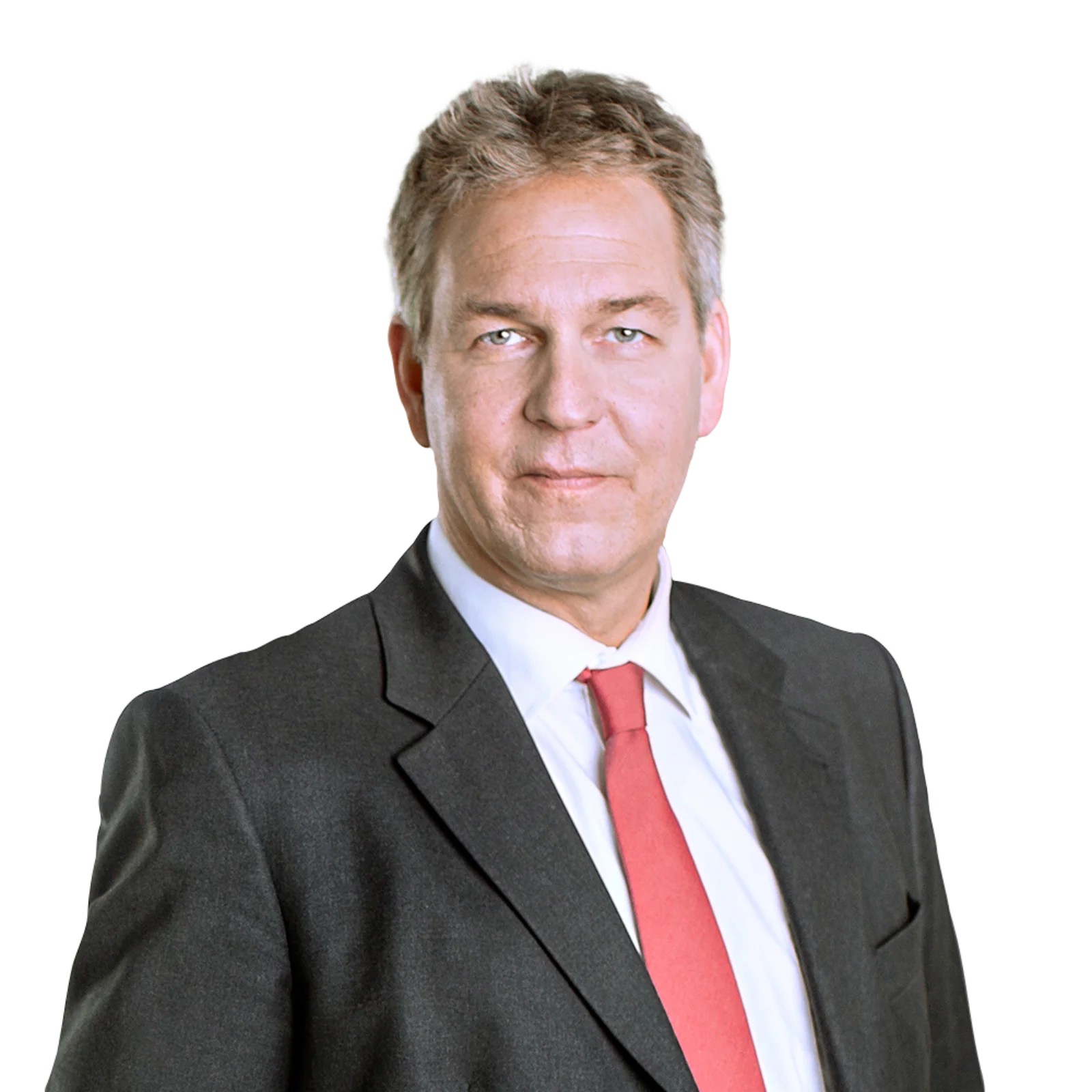 Portrait of Jens-Thorsten Rauer in a dark suit and red tie.