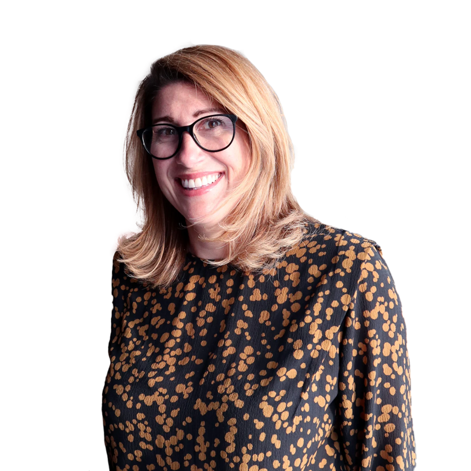 Portrait of Jacynthe Vachon wearing glasses and a black blouse with a gold pattern, smiling warmly.