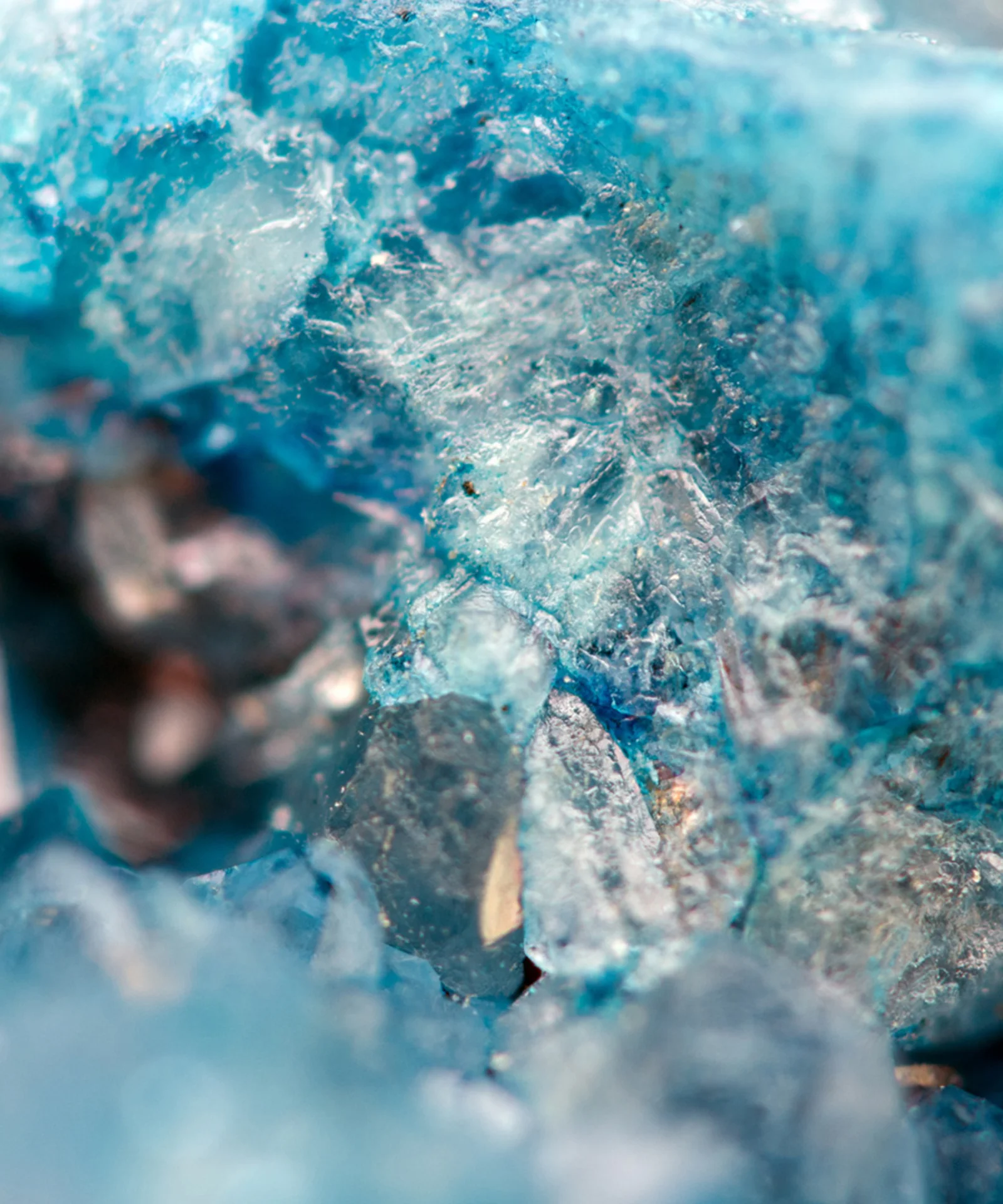 Close-up of intricate blue crystal formations, symbolising the precision and security of database management and policy as code in the Azure Cloud.