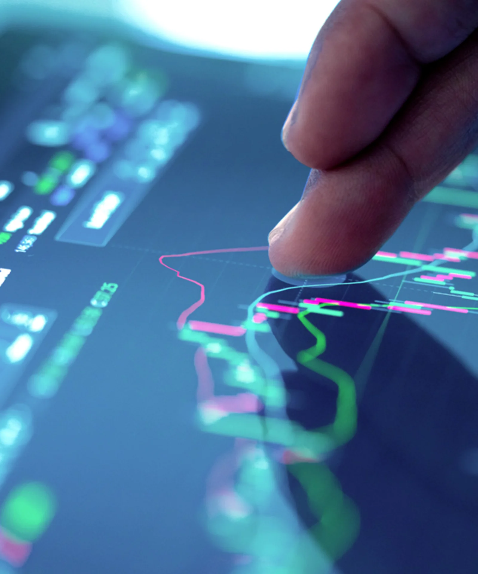 Key visual image representing share analysis with a close-up of a person interacting with a digital graph on a touchscreen.