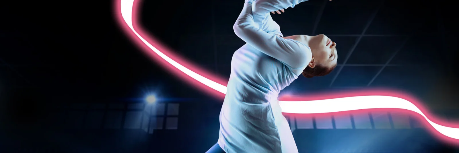 A female fencer in a white fencing uniform strikes a dramatic pose, bending backward while holding her sword. A vibrant pink neon light trail arcs behind her, enhancing the dynamic and energetic atmosphere of the scene.