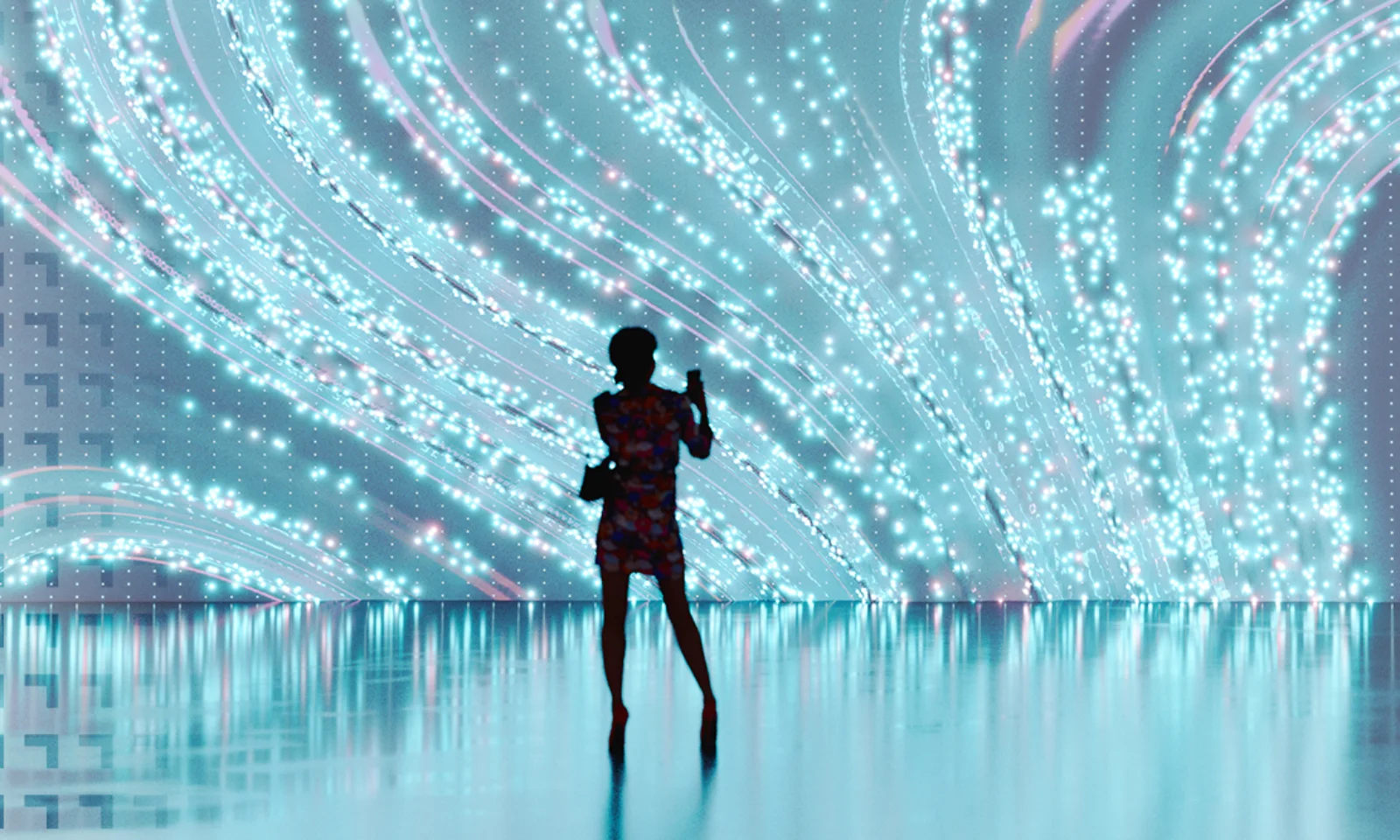 Silhouette of a person standing before a large, flowing digital light display, representing the interaction between humans and advanced digital technology.