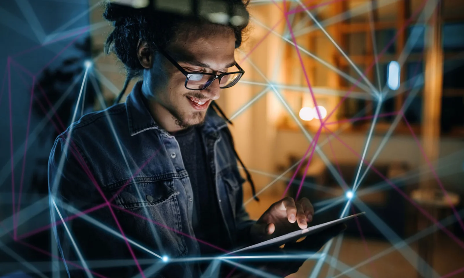 A man wearing glasses uses a tablet, surrounded by abstract digital lines representing Distributed Ledger Technology (DLT) and Blockchain connections, symbolising innovation and connectivity.